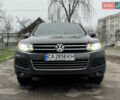 Серый Фольксваген Туарег, объемом двигателя 3 л и пробегом 260 тыс. км за 16700 $, фото 2 на Automoto.ua