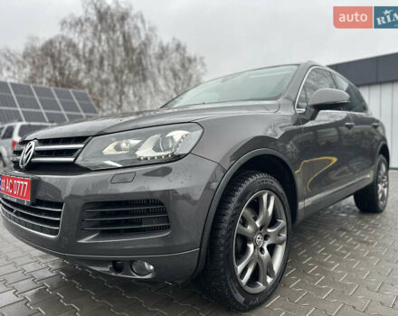 Сірий Фольксваген Туарег, об'ємом двигуна 3 л та пробігом 298 тис. км за 18500 $, фото 1 на Automoto.ua