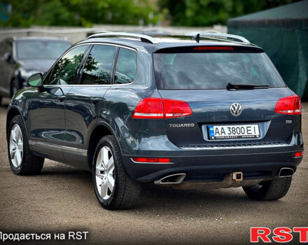 Серый Фольксваген Туарег, объемом двигателя 3 л и пробегом 308 тыс. км за 18500 $, фото 4 на Automoto.ua