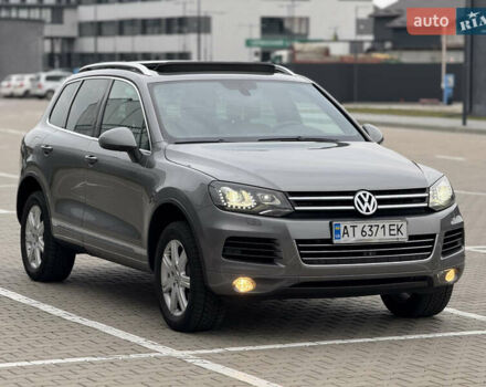 Сірий Фольксваген Туарег, об'ємом двигуна 3 л та пробігом 260 тис. км за 18700 $, фото 1 на Automoto.ua