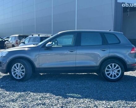 Серый Фольксваген Туарег, объемом двигателя 3 л и пробегом 294 тыс. км за 17890 $, фото 3 на Automoto.ua