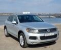 Серый Фольксваген Туарег, объемом двигателя 2.97 л и пробегом 188 тыс. км за 18500 $, фото 1 на Automoto.ua