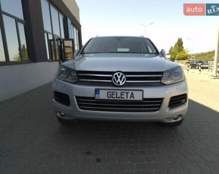 Серый Фольксваген Туарег, объемом двигателя 3 л и пробегом 215 тыс. км за 19300 $, фото 3 на Automoto.ua