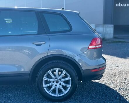 Серый Фольксваген Туарег, объемом двигателя 3 л и пробегом 294 тыс. км за 17890 $, фото 5 на Automoto.ua