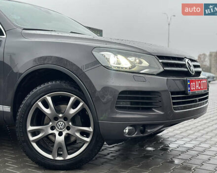 Сірий Фольксваген Туарег, об'ємом двигуна 3 л та пробігом 298 тис. км за 18500 $, фото 59 на Automoto.ua