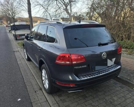 Серый Фольксваген Туарег, объемом двигателя 3 л и пробегом 238 тыс. км за 2248 $, фото 2 на Automoto.ua