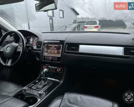 Сірий Фольксваген Туарег, об'ємом двигуна 3 л та пробігом 298 тис. км за 18500 $, фото 100 на Automoto.ua