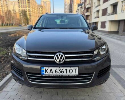 Серый Фольксваген Туарег, объемом двигателя 3 л и пробегом 189 тыс. км за 21500 $, фото 1 на Automoto.ua