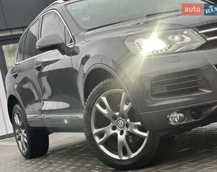 Сірий Фольксваген Туарег, об'ємом двигуна 3 л та пробігом 298 тис. км за 18500 $, фото 57 на Automoto.ua