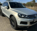 Серый Фольксваген Туарег, объемом двигателя 2.97 л и пробегом 296 тыс. км за 21000 $, фото 1 на Automoto.ua