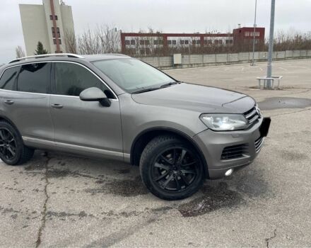 Серый Фольксваген Туарег, объемом двигателя 3.6 л и пробегом 249 тыс. км за 12700 $, фото 2 на Automoto.ua