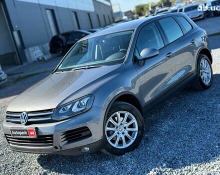 Серый Фольксваген Туарег, объемом двигателя 3 л и пробегом 294 тыс. км за 17890 $, фото 2 на Automoto.ua