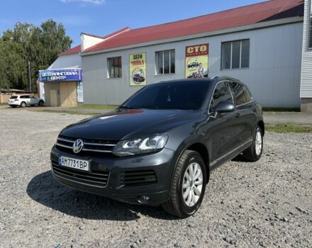 Серый Фольксваген Туарег, объемом двигателя 3 л и пробегом 253 тыс. км за 17000 $, фото 1 на Automoto.ua