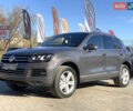 Серый Фольксваген Туарег, объемом двигателя 3 л и пробегом 260 тыс. км за 18899 $, фото 1 на Automoto.ua
