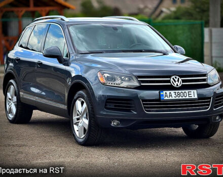 Серый Фольксваген Туарег, объемом двигателя 3 л и пробегом 308 тыс. км за 18500 $, фото 2 на Automoto.ua