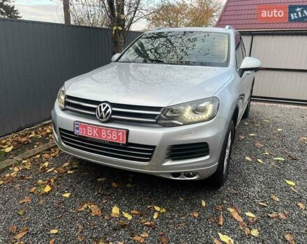 Серый Фольксваген Туарег, объемом двигателя 3 л и пробегом 232 тыс. км за 19700 $, фото 2 на Automoto.ua