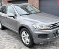 Серый Фольксваген Туарег, объемом двигателя 3 л и пробегом 290 тыс. км за 15599 $, фото 1 на Automoto.ua
