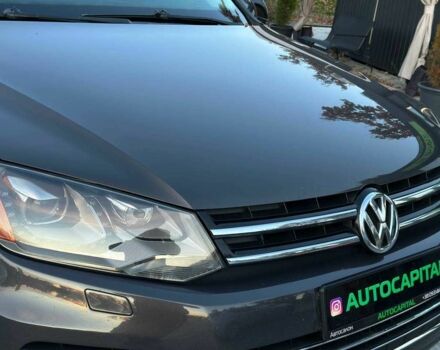 Серый Фольксваген Туарег, объемом двигателя 3 л и пробегом 296 тыс. км за 14490 $, фото 2 на Automoto.ua