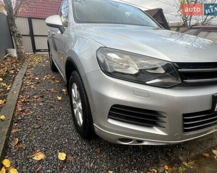 Серый Фольксваген Туарег, объемом двигателя 3 л и пробегом 232 тыс. км за 19700 $, фото 1 на Automoto.ua