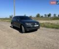 Серый Фольксваген Туарег, объемом двигателя 2.97 л и пробегом 277 тыс. км за 19999 $, фото 1 на Automoto.ua