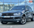 Серый Фольксваген Туарег, объемом двигателя 3 л и пробегом 226 тыс. км за 15490 $, фото 1 на Automoto.ua