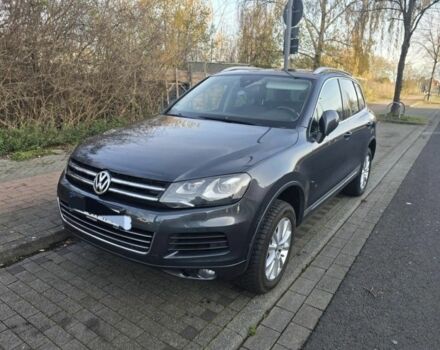 Серый Фольксваген Туарег, объемом двигателя 3 л и пробегом 238 тыс. км за 2248 $, фото 1 на Automoto.ua