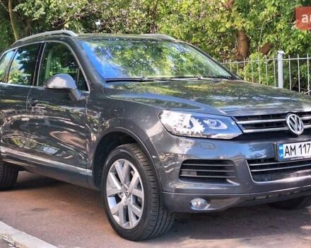 Серый Фольксваген Туарег, объемом двигателя 3 л и пробегом 235 тыс. км за 25000 $, фото 2 на Automoto.ua
