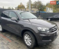 Серый Фольксваген Туарег, объемом двигателя 3 л и пробегом 280 тыс. км за 21500 $, фото 1 на Automoto.ua