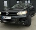 Серый Фольксваген Туарег, объемом двигателя 2.97 л и пробегом 210 тыс. км за 18500 $, фото 3 на Automoto.ua