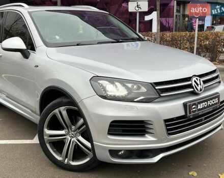 Серый Фольксваген Туарег, объемом двигателя 2.97 л и пробегом 223 тыс. км за 20490 $, фото 1 на Automoto.ua