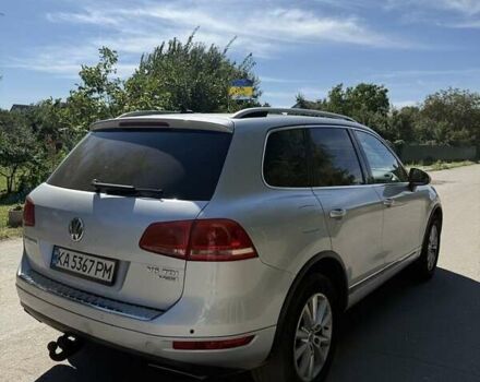 Серый Фольксваген Туарег, объемом двигателя 3 л и пробегом 280 тыс. км за 16000 $, фото 1 на Automoto.ua