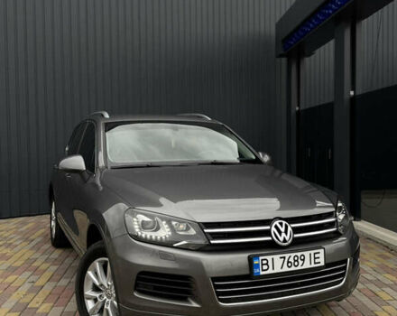 Серый Фольксваген Туарег, объемом двигателя 2.97 л и пробегом 360 тыс. км за 17500 $, фото 2 на Automoto.ua