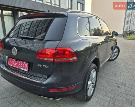 Серый Фольксваген Туарег, объемом двигателя 2.97 л и пробегом 248 тыс. км за 16500 $, фото 2 на Automoto.ua