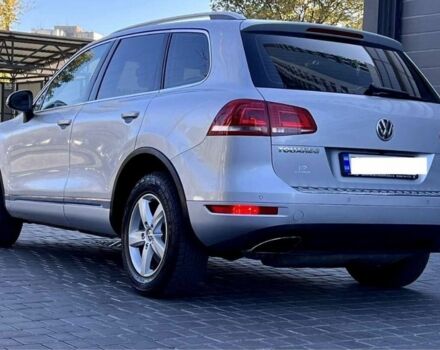 Серый Фольксваген Туарег, объемом двигателя 3 л и пробегом 298 тыс. км за 17000 $, фото 4 на Automoto.ua