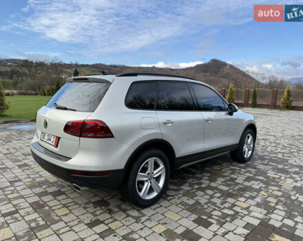 Серый Фольксваген Туарег, объемом двигателя 3 л и пробегом 230 тыс. км за 21900 $, фото 5 на Automoto.ua