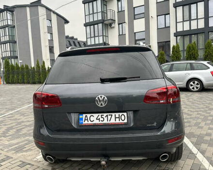 Серый Фольксваген Туарег, объемом двигателя 2.97 л и пробегом 297 тыс. км за 21500 $, фото 3 на Automoto.ua