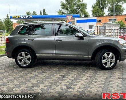 Сірий Фольксваген Туарег, об'ємом двигуна 3 л та пробігом 215 тис. км за 17500 $, фото 1 на Automoto.ua