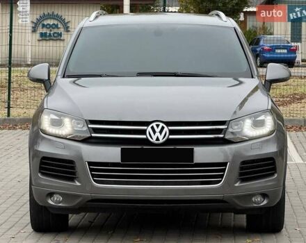 Серый Фольксваген Туарег, объемом двигателя 3 л и пробегом 220 тыс. км за 14900 $, фото 1 на Automoto.ua