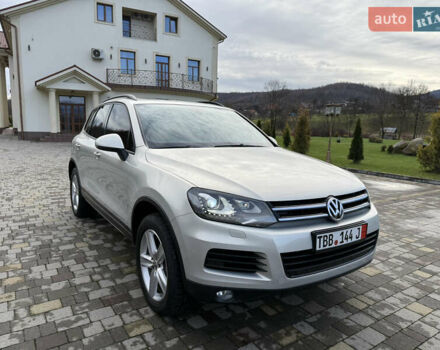 Серый Фольксваген Туарег, объемом двигателя 3 л и пробегом 230 тыс. км за 21900 $, фото 1 на Automoto.ua
