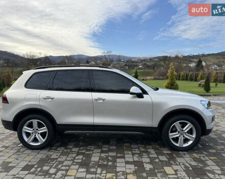 Серый Фольксваген Туарег, объемом двигателя 3 л и пробегом 230 тыс. км за 21900 $, фото 3 на Automoto.ua