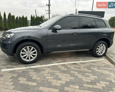 Серый Фольксваген Туарег, объемом двигателя 2.97 л и пробегом 297 тыс. км за 21500 $, фото 1 на Automoto.ua