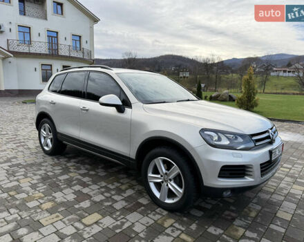 Серый Фольксваген Туарег, объемом двигателя 3 л и пробегом 230 тыс. км за 21900 $, фото 2 на Automoto.ua