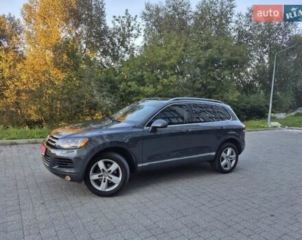 Серый Фольксваген Туарег, объемом двигателя 2.97 л и пробегом 248 тыс. км за 16500 $, фото 43 на Automoto.ua