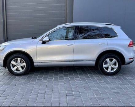 Серый Фольксваген Туарег, объемом двигателя 3 л и пробегом 298 тыс. км за 17000 $, фото 2 на Automoto.ua