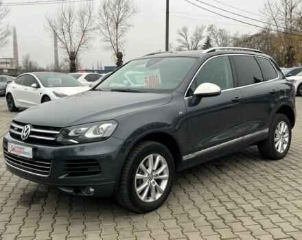 Серый Фольксваген Туарег, объемом двигателя 3 л и пробегом 223 тыс. км за 19500 $, фото 2 на Automoto.ua