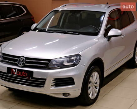 Серый Фольксваген Туарег, объемом двигателя 3 л и пробегом 219 тыс. км за 17900 $, фото 2 на Automoto.ua