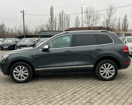 Серый Фольксваген Туарег, объемом двигателя 3 л и пробегом 223 тыс. км за 19500 $, фото 3 на Automoto.ua