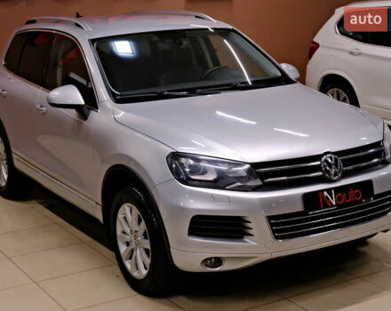 Серый Фольксваген Туарег, объемом двигателя 3 л и пробегом 219 тыс. км за 17900 $, фото 3 на Automoto.ua