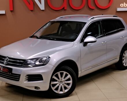 Серый Фольксваген Туарег, объемом двигателя 3 л и пробегом 219 тыс. км за 17900 $, фото 1 на Automoto.ua