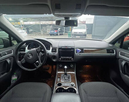 Серый Фольксваген Туарег, объемом двигателя 3 л и пробегом 340 тыс. км за 17200 $, фото 1 на Automoto.ua